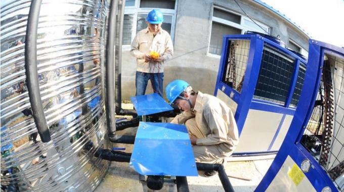 空氣源熱泵供暖養(yǎng)豬示范點送電成功